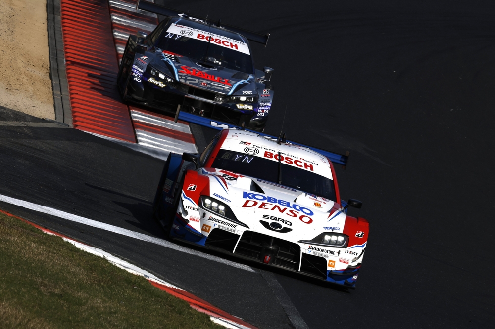 Bumper to bumper action in the opening race at the Okayama International Circuit
